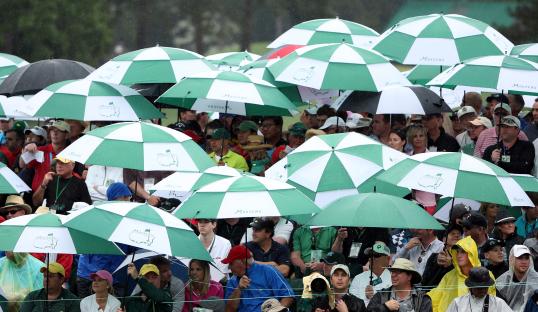Masters chaos as fans are BANNED from entering Augusta course and practice is delayed just days before tournament starts
