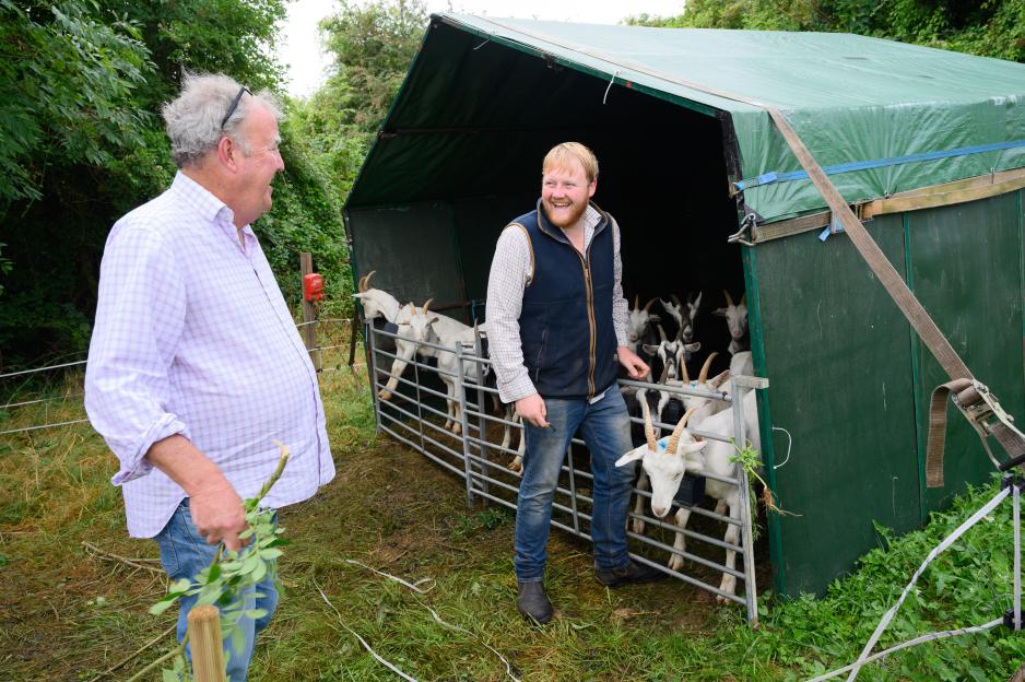 Jeremy Clarkson and Kaleb Cooper with goats.