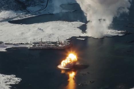 Rocket exploding in water near a snowy island.