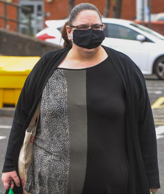 Tracey Connelly, Baby P's mother, wearing a face mask while shopping.