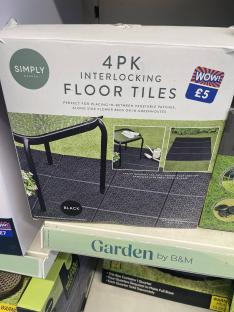 Box of four interlocking black floor tiles for £5.