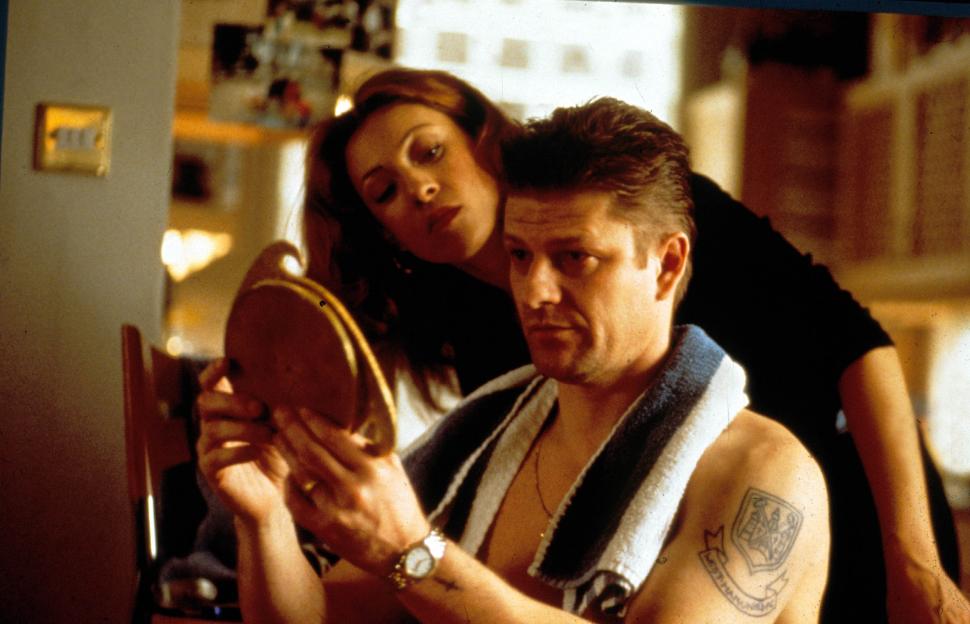 Alex Kingston and Sean Bean in a scene from Essex Boys.