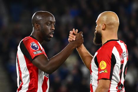 Yoane Wissa and Bryan Mbeumo celebrating a goal.