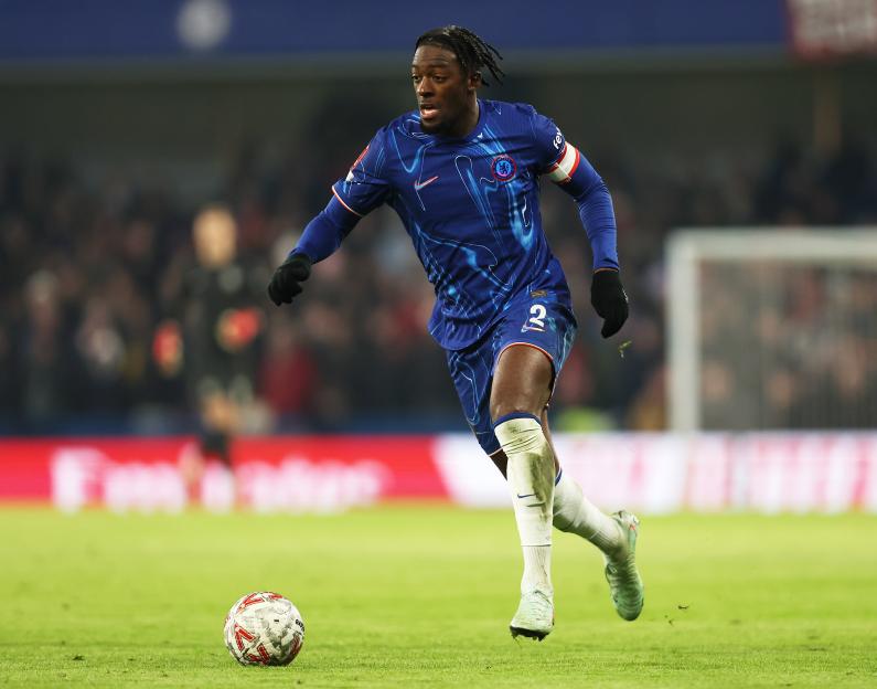 Axel Disasi of Chelsea controlling the ball during a soccer match.