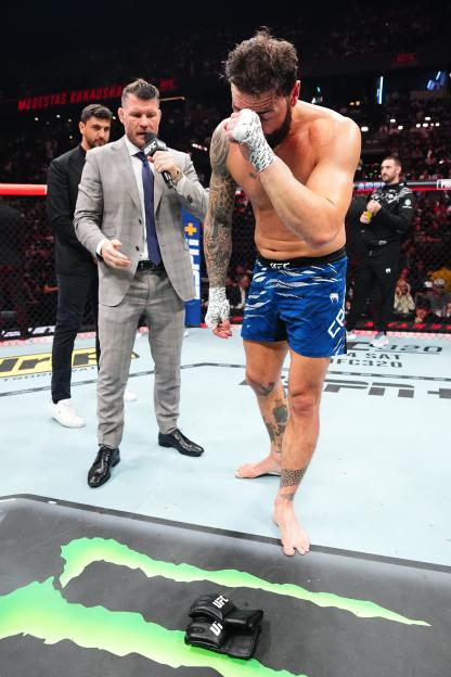 Paul Craig of Scotland announcing his retirement after a UFC fight.