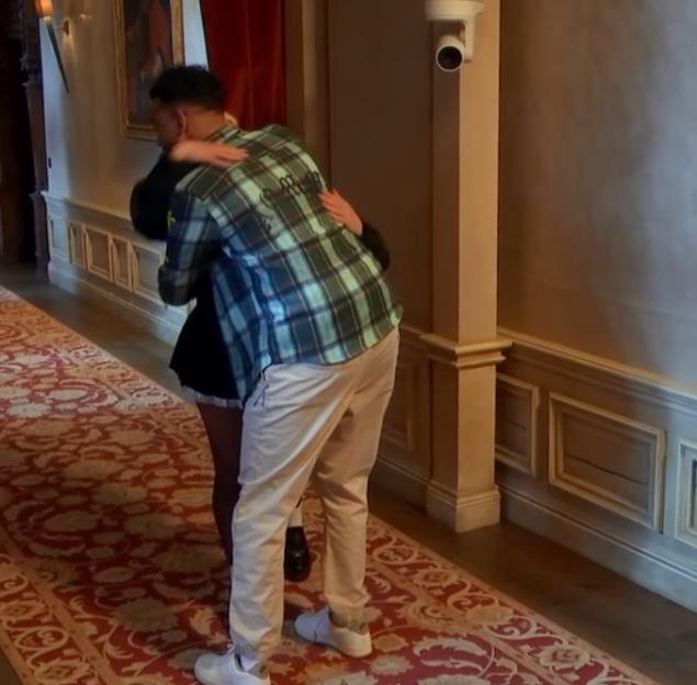 Niko embracing Paloma Faith in a hug.
