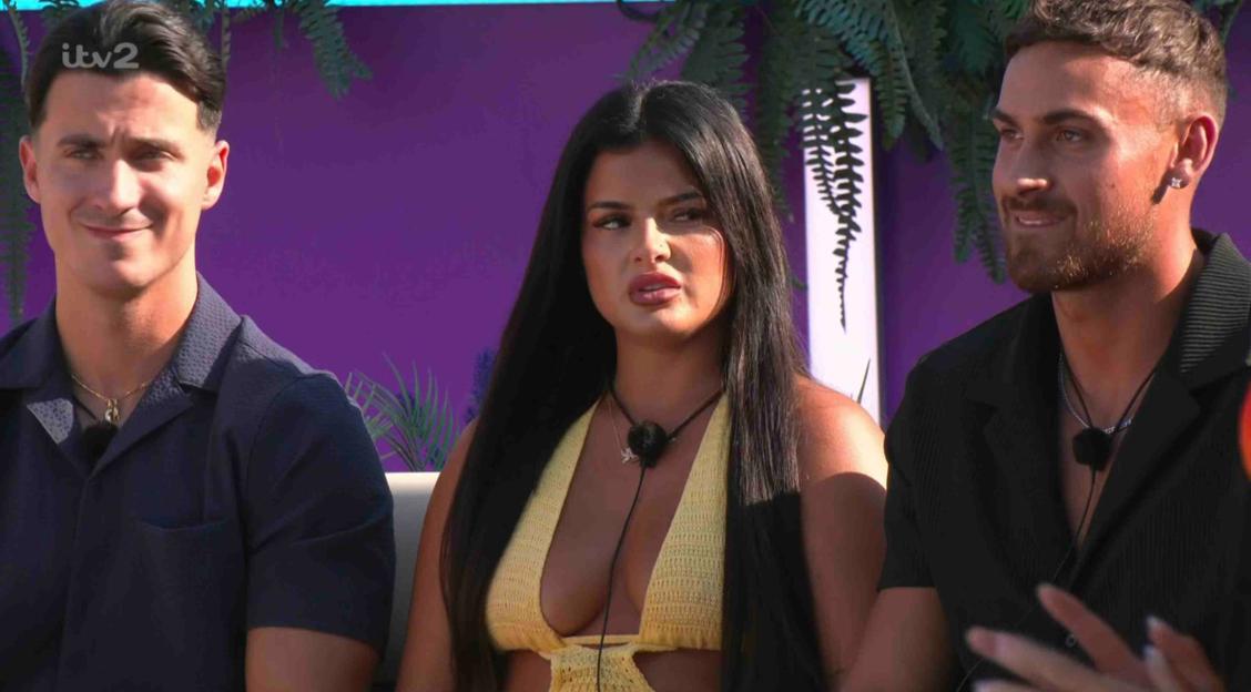 Three Love Island contestants sitting together.