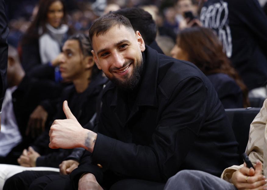 Gianluigi Donnarumma giving a thumbs up.