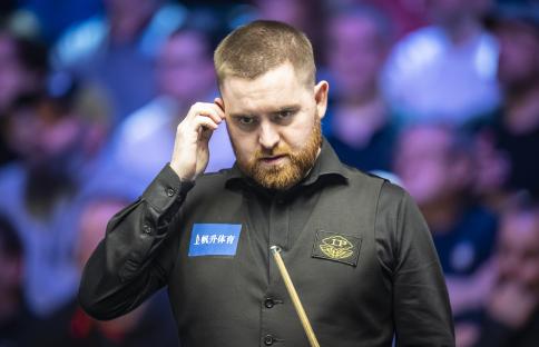 Jak Jones playing snooker.