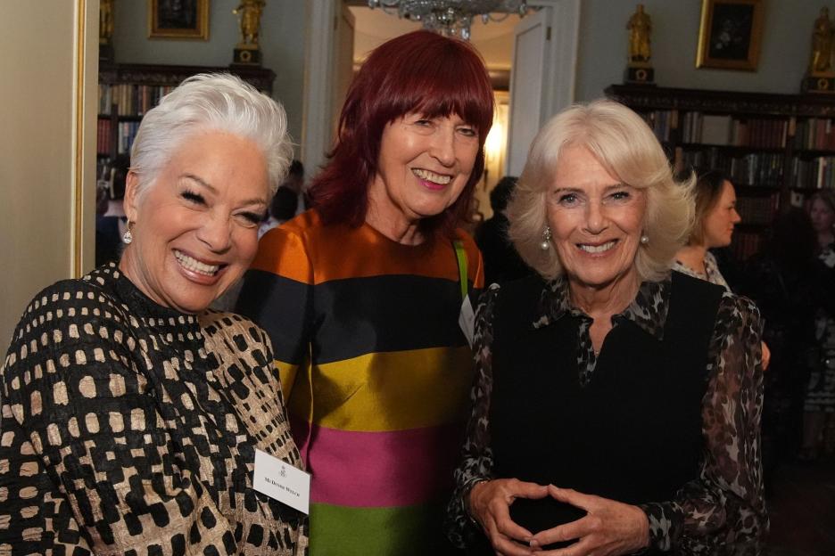 Queen Camilla beams alongside Loose Women’s Janet Street-Porter and Denise Welch at charity reception