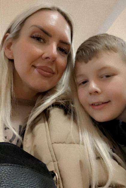Close-up photo of a woman and young boy.