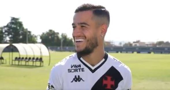 Coutinho smiling in soccer jersey.