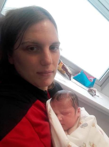 Leeanna holding her baby Caiden, who was born with congenital ichthyosis.