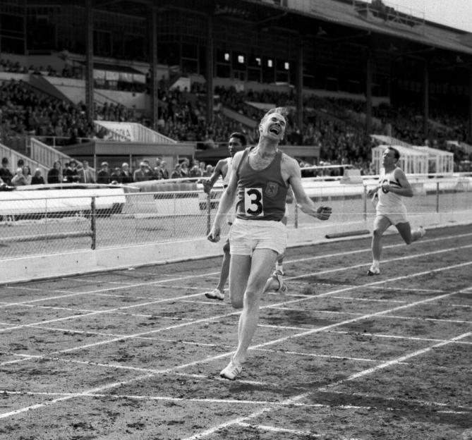 Menzies Campbell, a Glasgow University law student, crossing the finishing tape to win the 220 yards final at the AAA athletics Championships in London.