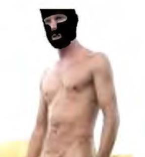 Photo of a shirtless man wearing a black balaclava.