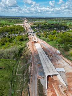 Aerial view of HS2 construction site in Burton Green, Warwickshire, showing a 700m tunnel under construction.