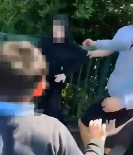 Police arresting suspects in connection with an assault.