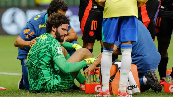 Why is Alisson not playing for Liverpool?
