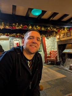 Portrait of a man in a pub.