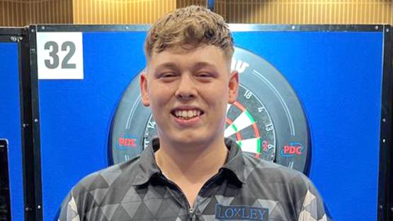 Darts star, 22, ‘publicly shamed’ into changing iconic outfit after being forced to wear extra pair of socks