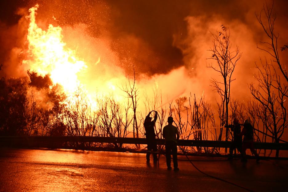 Huge wildfires spread across Brit tourist hotspots with hotels evacuated ‘by the minute’ as holidaymakers flee resorts