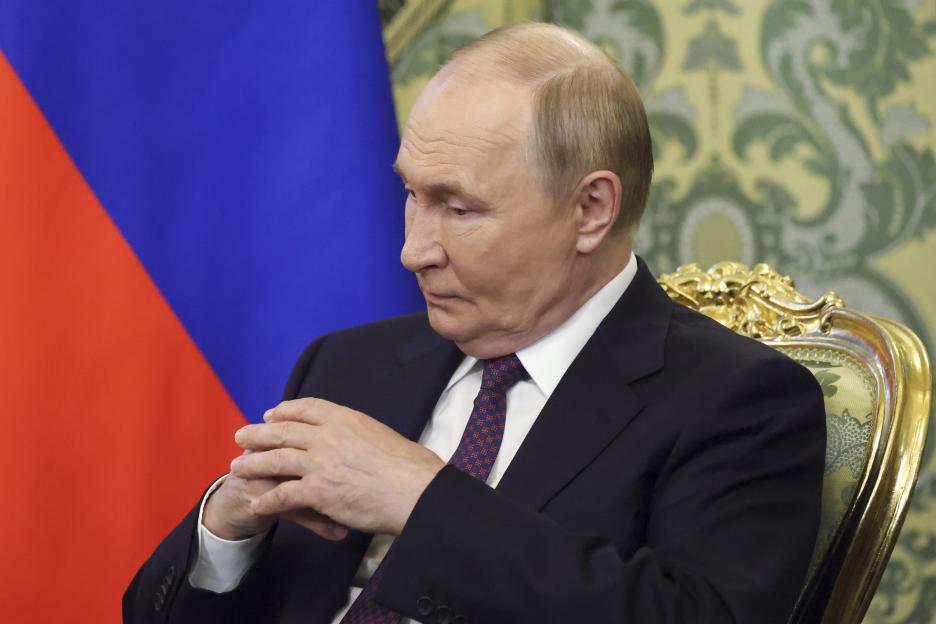 Vladimir Putin at a meeting.