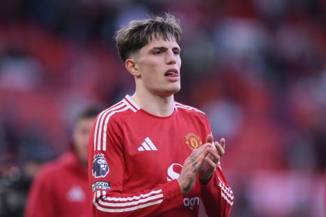 Alejandro Garnacho of Manchester United applauding.