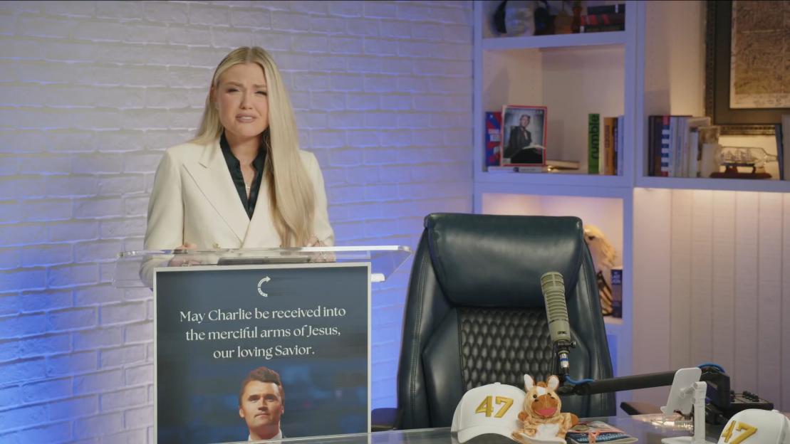 Erika Kirk speaking at a podium about her late husband, Charlie Kirk.