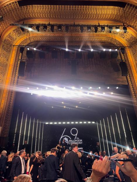 Audience gathered in a grand theater for the 69th Ballon d'Or Ceremony.