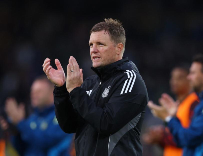 Eddie Howe applauding after a soccer match.