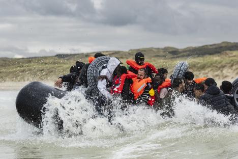 Migrants in an overcrowded inflatable boat crossing the English Channel.