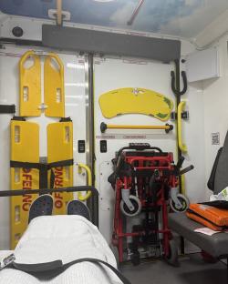 Interior of an ambulance with medical equipment.