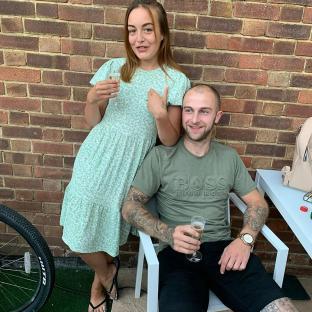 A couple toasting with champagne.