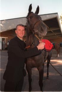 Snooker player Peter Ebdon with a horse.