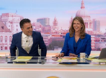 Adil Ray and Kate Garraway on the Good Morning Britain set.