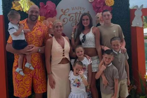 Proud Paris Fury poses with family in glam Barbados snaps but eagle-eyed fans spot a child swearing for the camera AGAIN