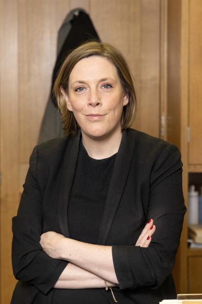 Jess Phillips, Labour MP for Birmingham Yardley, smiling slightly with her arms crossed.