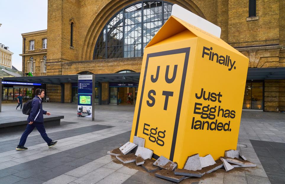 Giant yellow egg carton advertising Just Egg at King's Cross Station.