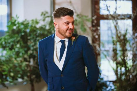 Luke Worley in a blue suit.