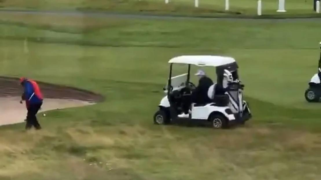 Hilarious moment Donald Trump’s golf caddie appears to subtly drop ball in prime spot before he arrives to take shot