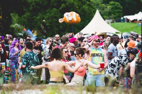 A large crowd of people at the Shindig Festival.