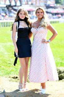 Kerry Katona and her daughter Heidi at a racecourse.