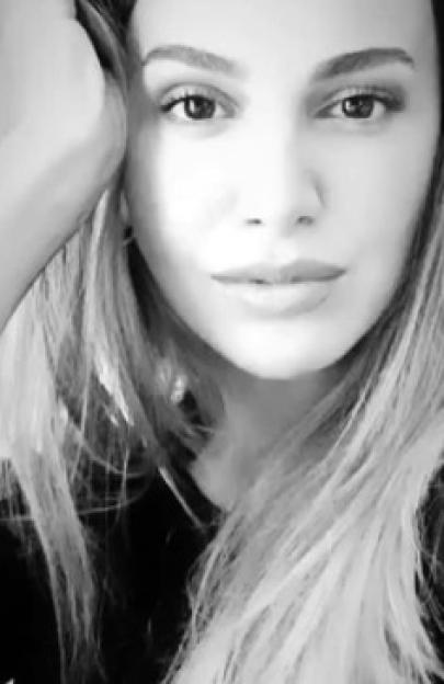 Black and white portrait of a woman.