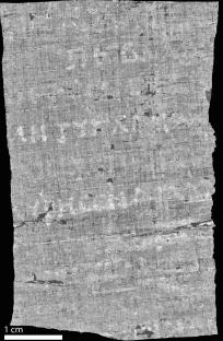 Burned ancient scroll deciphered by AI.