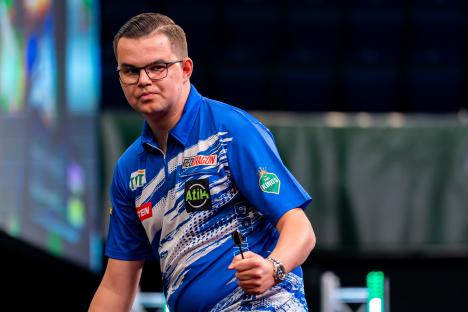 Darts star painfully walked into toilet wall before toppling Luke Littler to reach German Grand Prix final