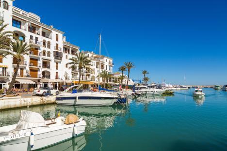 Yachts and boats docked at a marina in Spain.