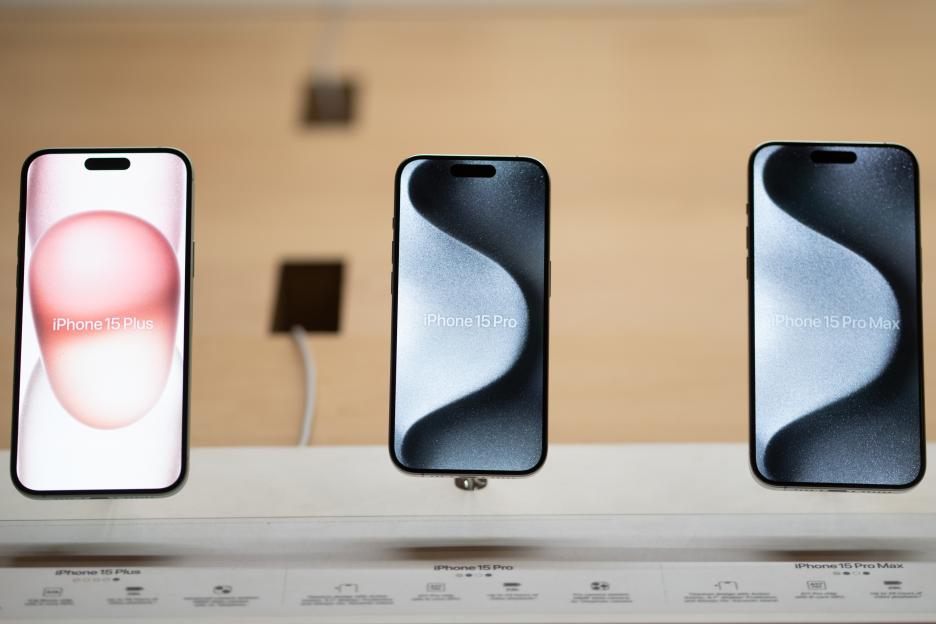 Three iPhone 15 models, from left to right: iPhone 15 Plus, iPhone 15 Pro, and iPhone 15 Pro Max.