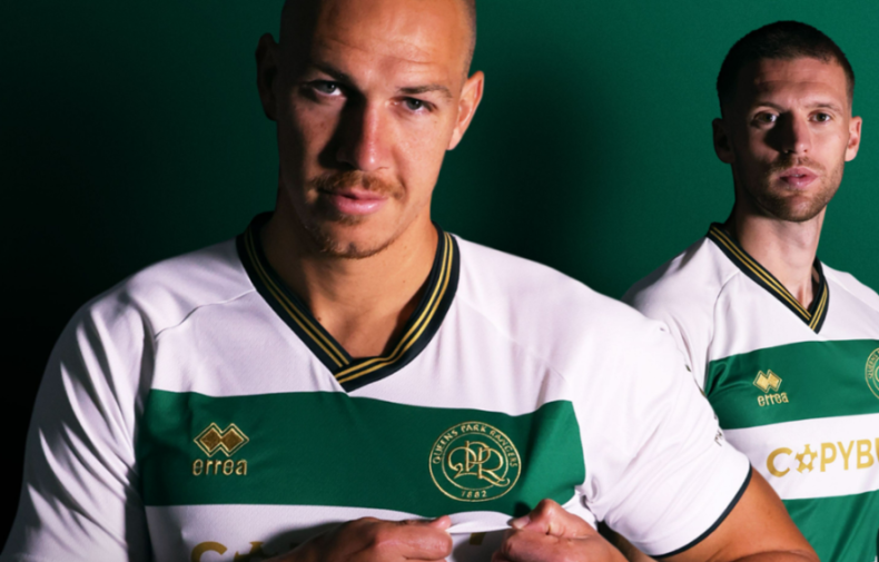 Two QPR players in new white and green soccer jerseys.