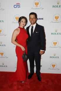 MELBOURNE, AUSTRALIA - DECEMBER 10: U.S. Team's Xander Schauffele and partner, Maya Lowe, walk the red carpet prior to Presidents Cup at The Royal Melbourne Golf Club on December 10, 2019, in Melbourne, Australia. (Photo by Con Chronis/PGA TOUR via Getty Images)