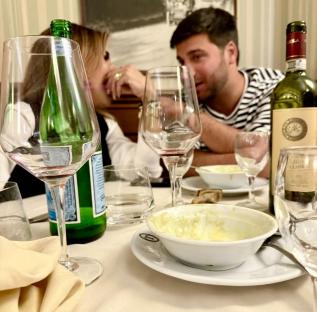A couple dining at a restaurant.